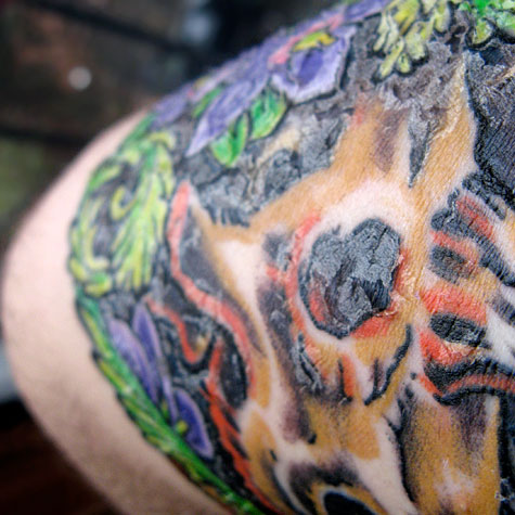 Peeling Triceratops tattoo